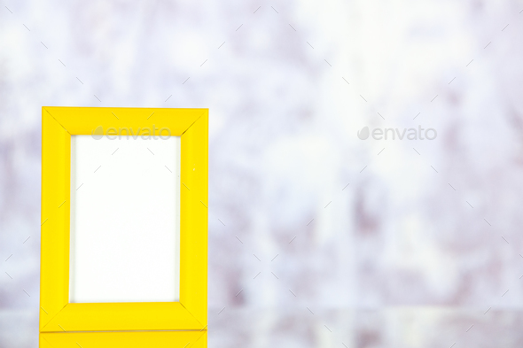 front view yellow picture frame on light background gift portrait photo color present family picture