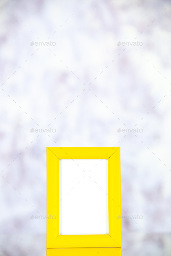 front view yellow picture frame on light background gift portrait photo present family picture shoot