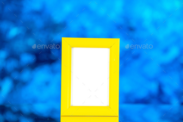 front view yellow picture frame on light blue background portrait photo color shoot family gift