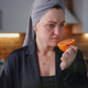 Sick woman trying to sense smell of fresh orange - PhotoDune Item for Sale