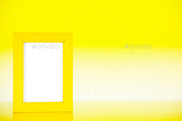 front view yellow picture frame on yellow background color gift present portrait family photo shoot