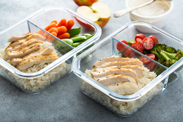 Meal prep containers with healthy lunch to go