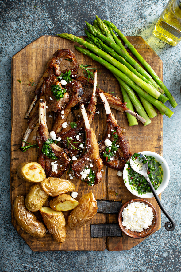 Grilled lamb chops with asparagus and potatoes Stock Photo by fahrwasser