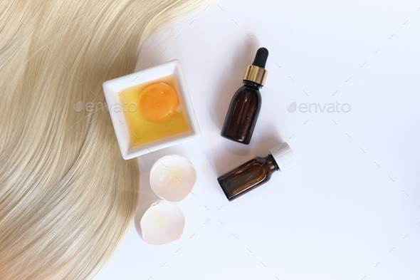female hair isolated on white background. hair restoration and treatment after winter.