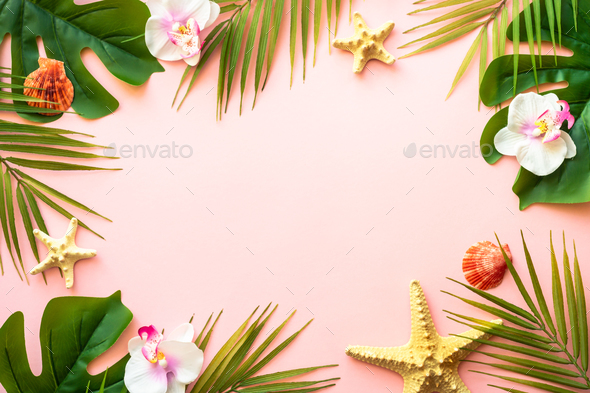 Summer flat lay background tropical leaves on pink. Stock Photo by Nadianb