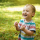 Happy toddler boy playing in the park on a sunny day. - PhotoDune Item for Sale