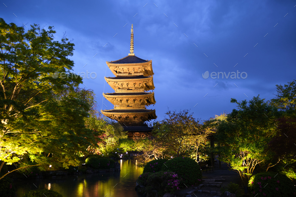 To-ji Temple pagoda illuminated in a rainy evening.