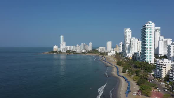 City Beach with Modern Skyscrapers Aerial View
