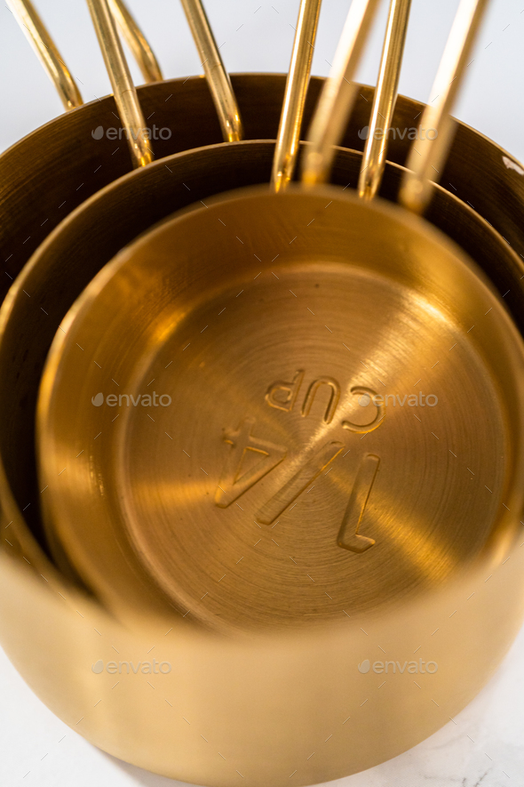 Measuring cups and spoons Stock Photo by arina-habich