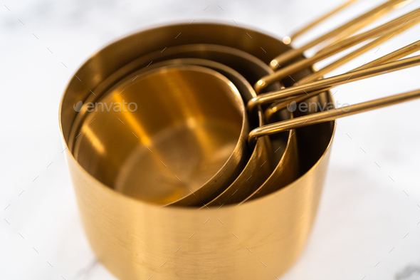 Measuring cups and spoons Stock Photo by arina-habich