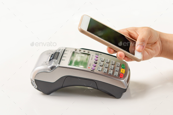 Contactless payment by smartphone. Payment with NFC technology - Stock Photo - Images