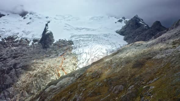 Aerial view of the high altitude glaciers of Peru; melting due to climate change causing flooding an alt