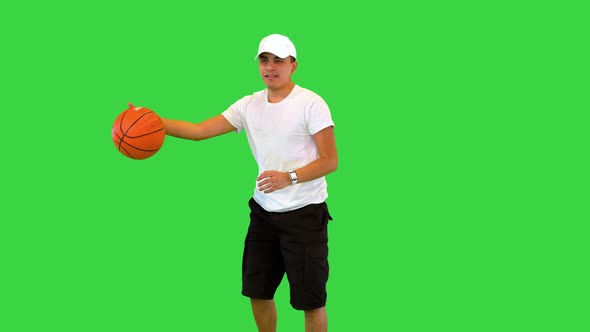 Young Mexican Guy Enjoy Playing Basketball Has Fun Happy Smiling Latin Teen Practicing with Ball on