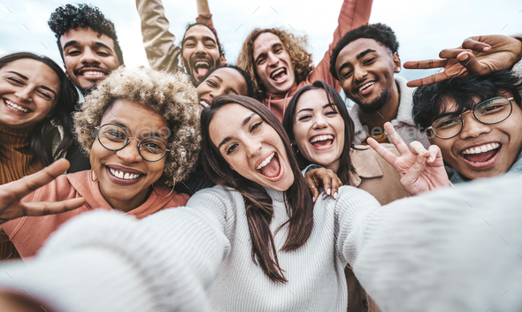 International group of young people laughing at camera outside Stock ...