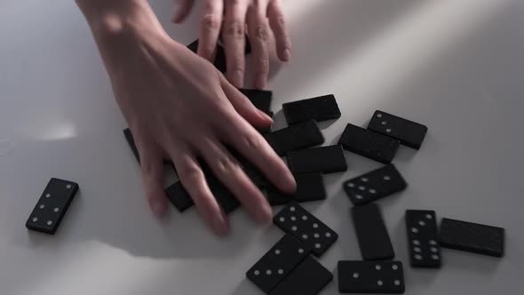 Couple Playing Dominoes at Home