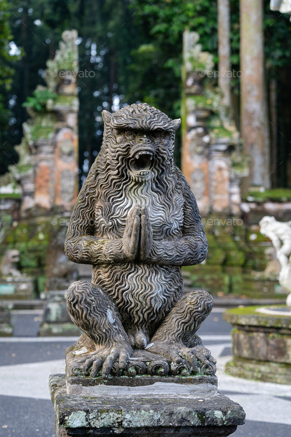 Monkey statue at Sangeh monkey forest in Bali near Ubud village. Indonesia - Stock Photo - Images
