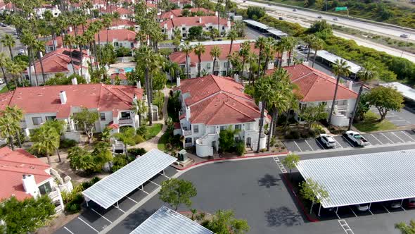 Aerial View of Typical Southern California Spanish Style Residential Condo with Swimming Pool alt