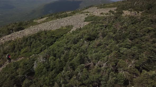 Aerial footage of White Cap Mountain situated within the watershed of the Pleasant River located in alt