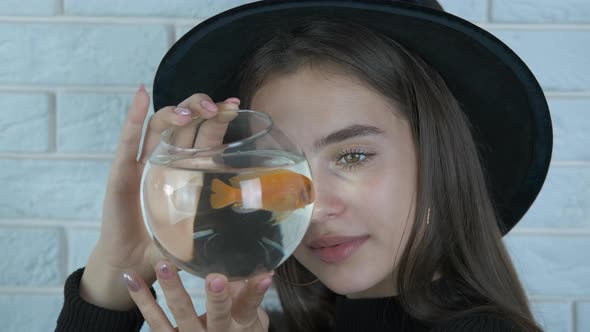 Girl with a fish.  alt