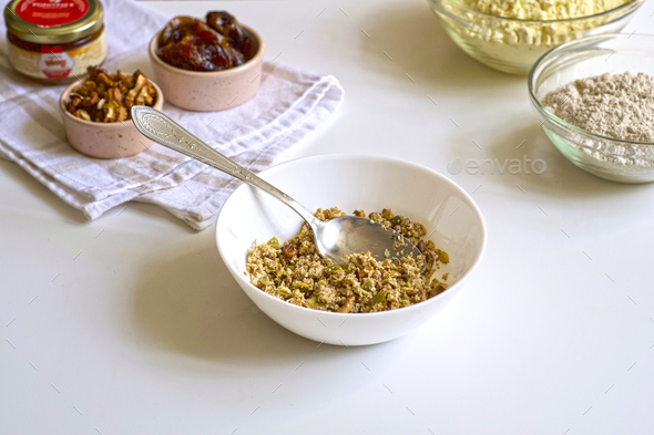 Step-by-step preparation of vegan gluten-free corn oat cookies with raisins, honey, coconut oil.