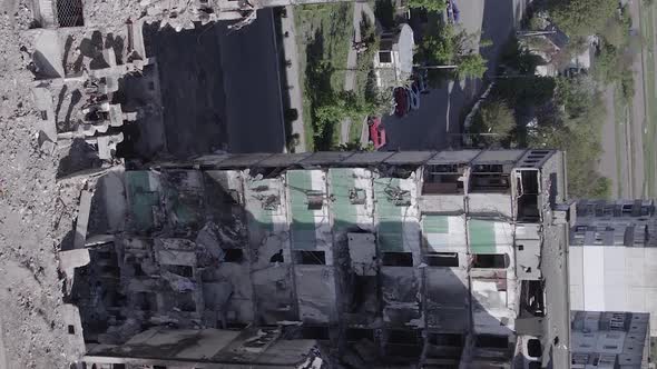 Vertical Video of a Multistorey Building Destroyed During the War in Ukraine alt