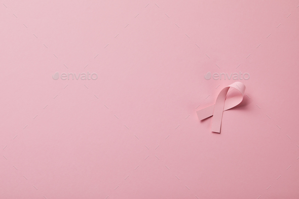 breast cancer ribbon on light pink background Stock Photo by  LightFieldStudios