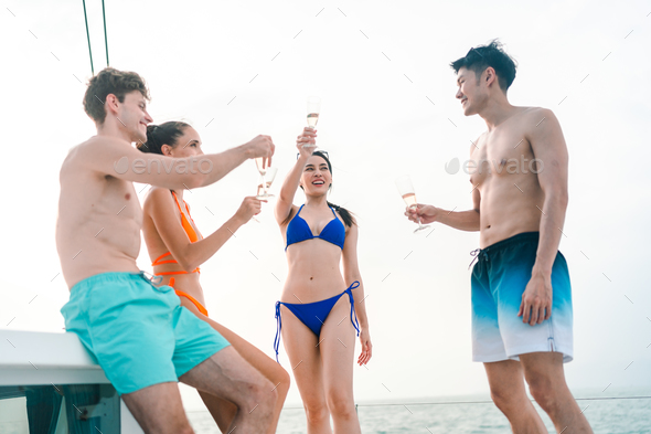 Group Of Friends Young Happy Attractive Men And Women In Bikini