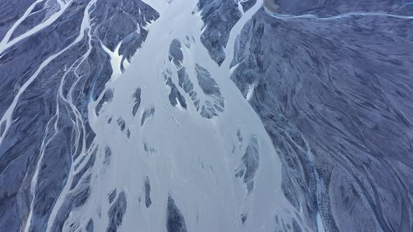 Aerial Drone View of Glacial River System of Iceland, Melt Water from Glaciers, Climate Change alt