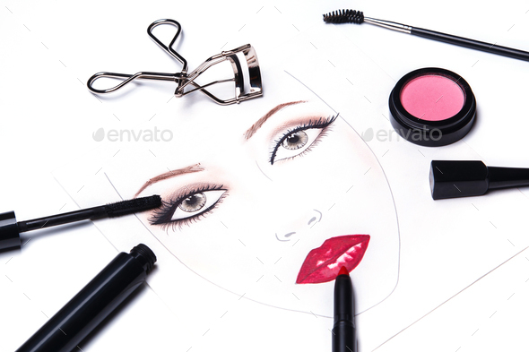 Face chart and different makeup objects and cosmetics