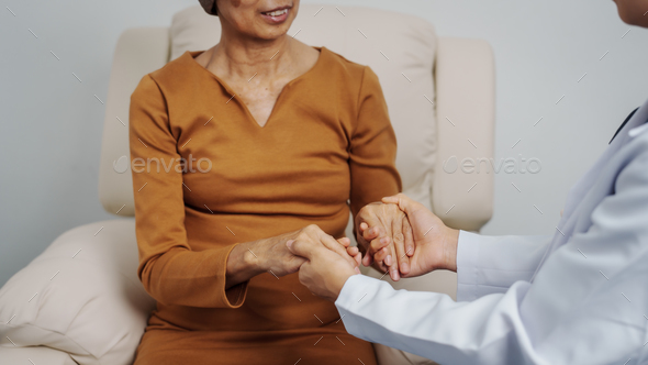 Elderly Asian female patients with cancer specialists meet by appointment to receive treatment
