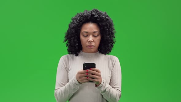Green Screen Young African Female Using Mobile Shows Feel Disappointment