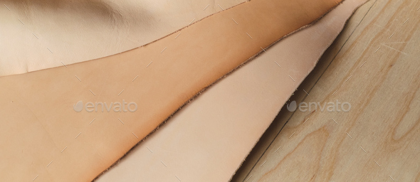 display of eco-friendly, beige leather swatches that combine style and sustainability. trend of
