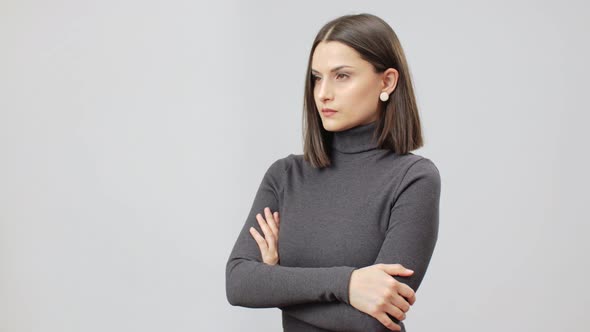 Serious Caucasian Woman In Grey Turtle Neck Bodycon Dress, Women Power