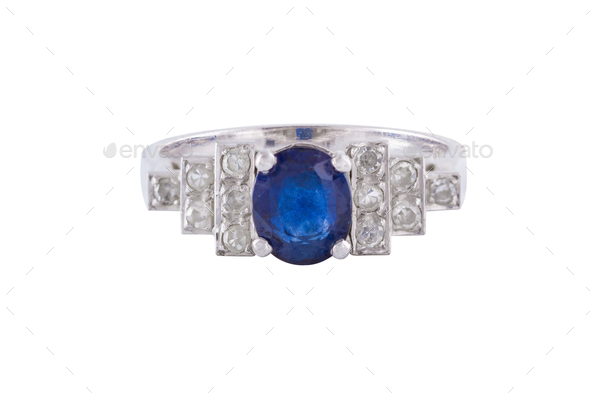 Female sapphire ring with diamonds isolated on a white background