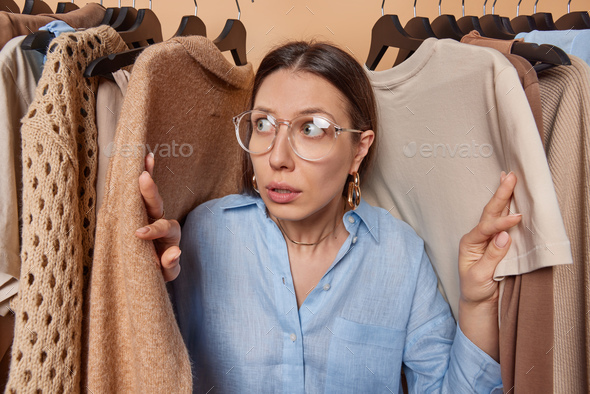 The girl in the glasses poses by the seaa Stock Photo | Adobe Stock