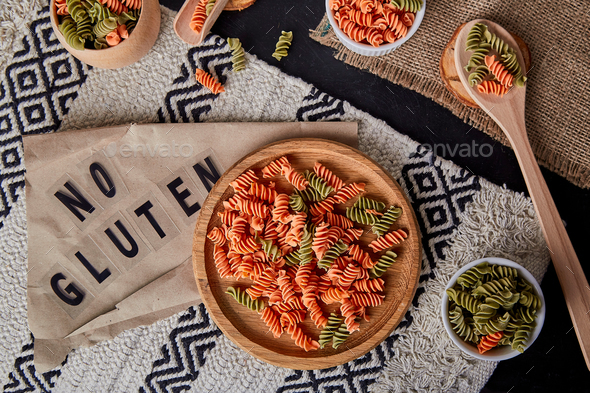 Colorful green pea and carrot pasta fusilli with whole grain wheats with no gluten.