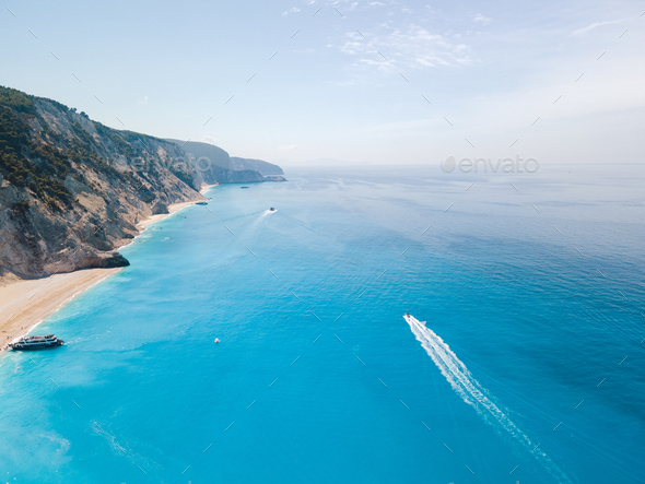 aerial view of Egremni beach at Lefkada island. speed boat at blue water - Stock Photo - Images