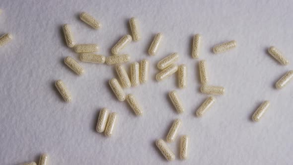 Rotating stock footage shot of vitamins and pills - VITAMINS 0086 alt
