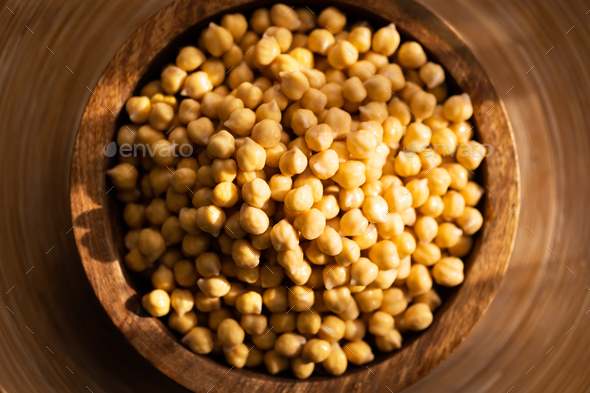 Chickpea in a wooden plate - Stock Photo - Images