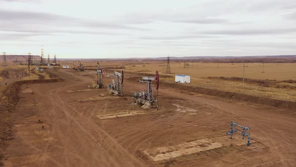 Pump Jack in Vast Oil Fields in Russia alt
