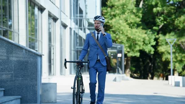 Trader Man With Bike Walking On Job