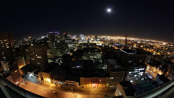 Time lapse at night of the skyline of cape town, south africa. Rooftop panorama shot. Super wide sho alt