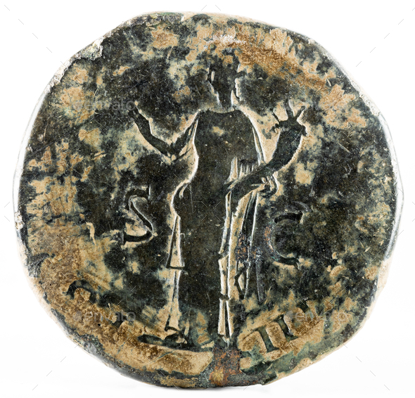 Closeup shot of an ancient Roman sestertius coin with emperor Hadrian inscription