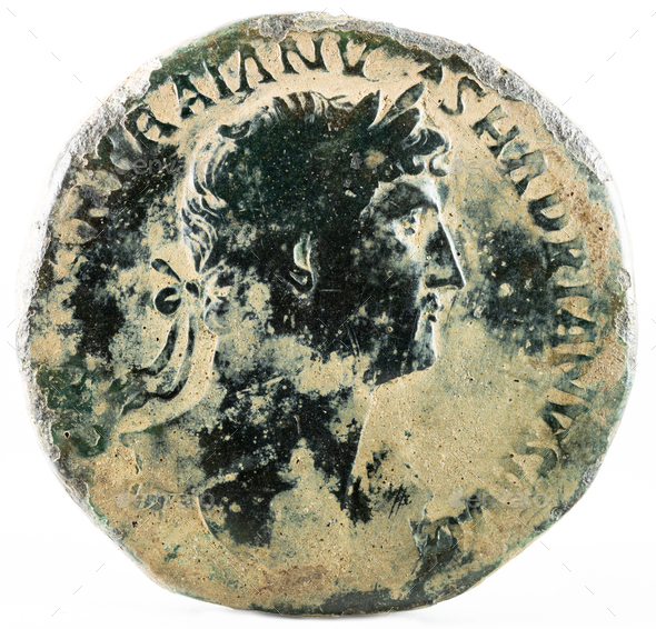 Closeup shot of an ancient Roman sestertius coin with emperor Hadrian inscription
