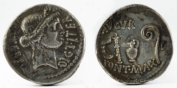 Closeup shot of ancient Roman denarius coin with Julius Caesar inscription
