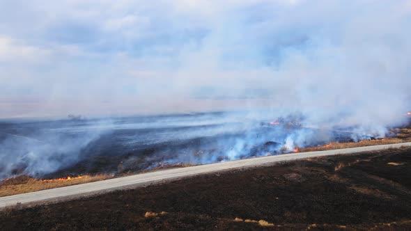 Aerial View of a Burning Dry Field alt