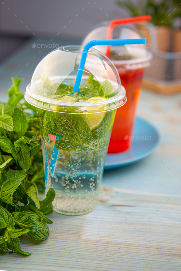 Cocktail mojito in plastic glass with ice Stock Photo by ©eduardkraft  11955436