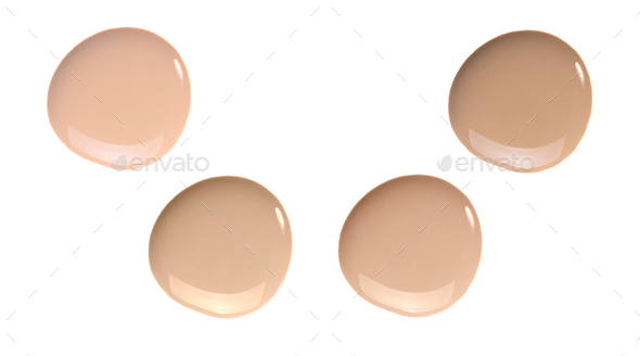 Makeup foundation cream smear smudge swatch shades isolated on white. Nude cosmetic bb cc cream