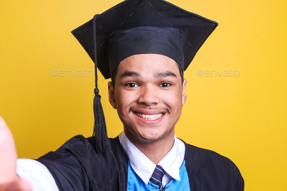 Pov Of Graduated Man Wearing Cap And Ceremony Robe Taking Selfie