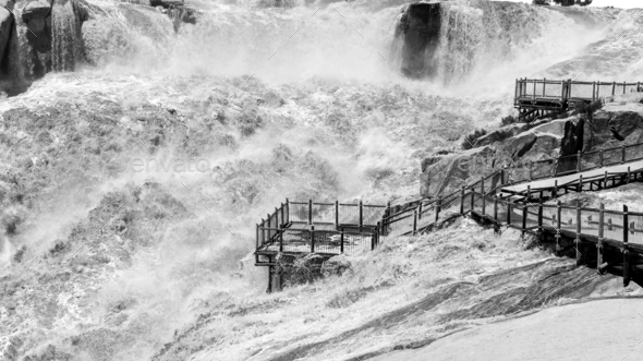 Flooded viewpoint at main Augrabies waterfall. Monochrome Stock Photo ...